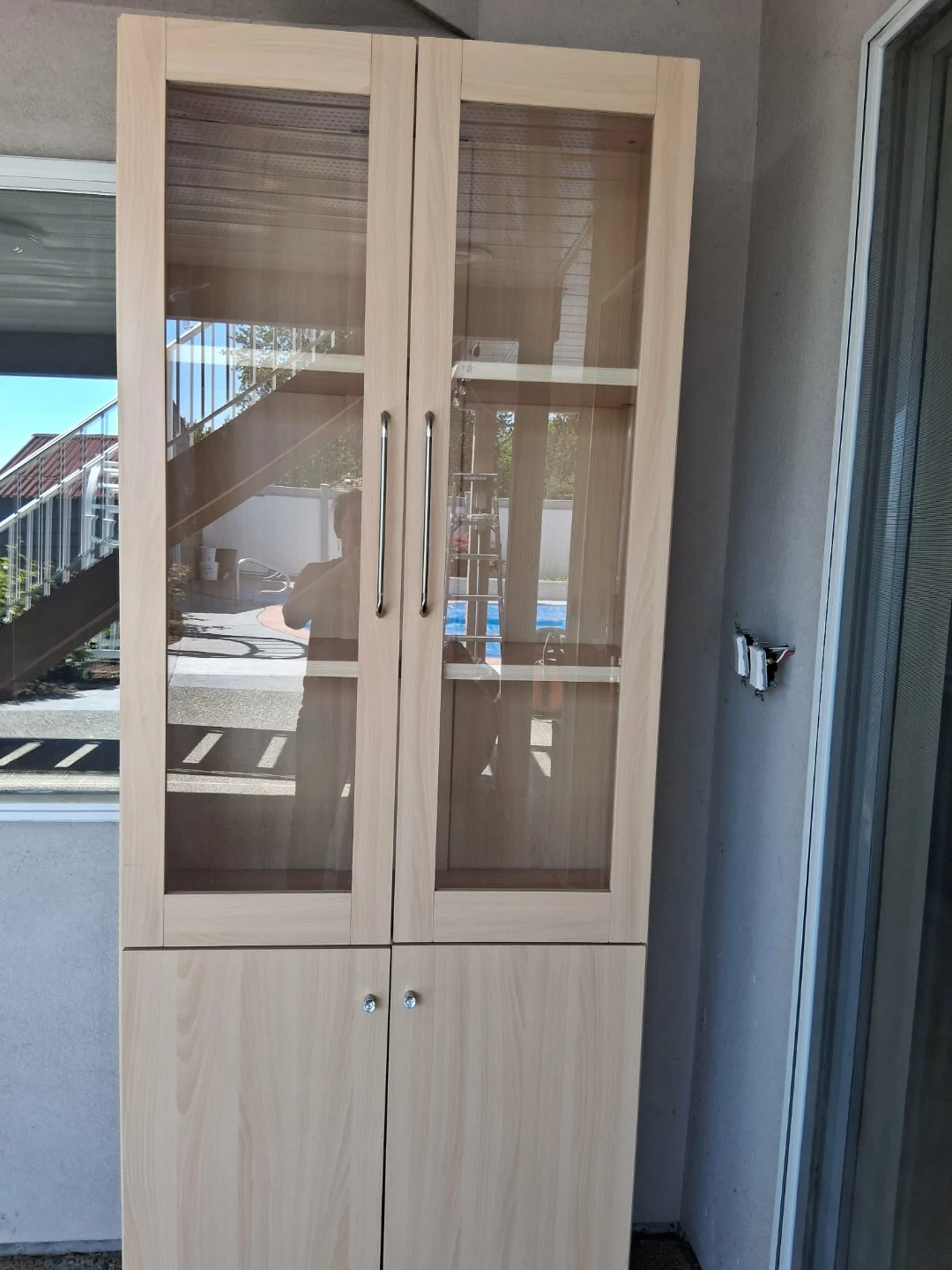 Tall Display Cabinet with Glass Doors