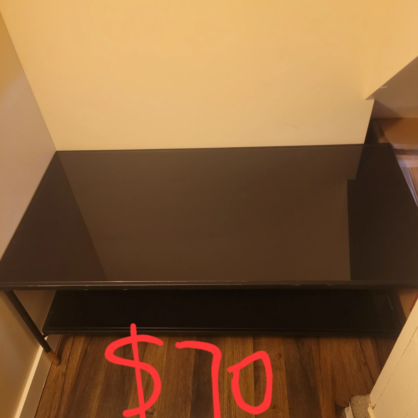 Black glass top coffee table