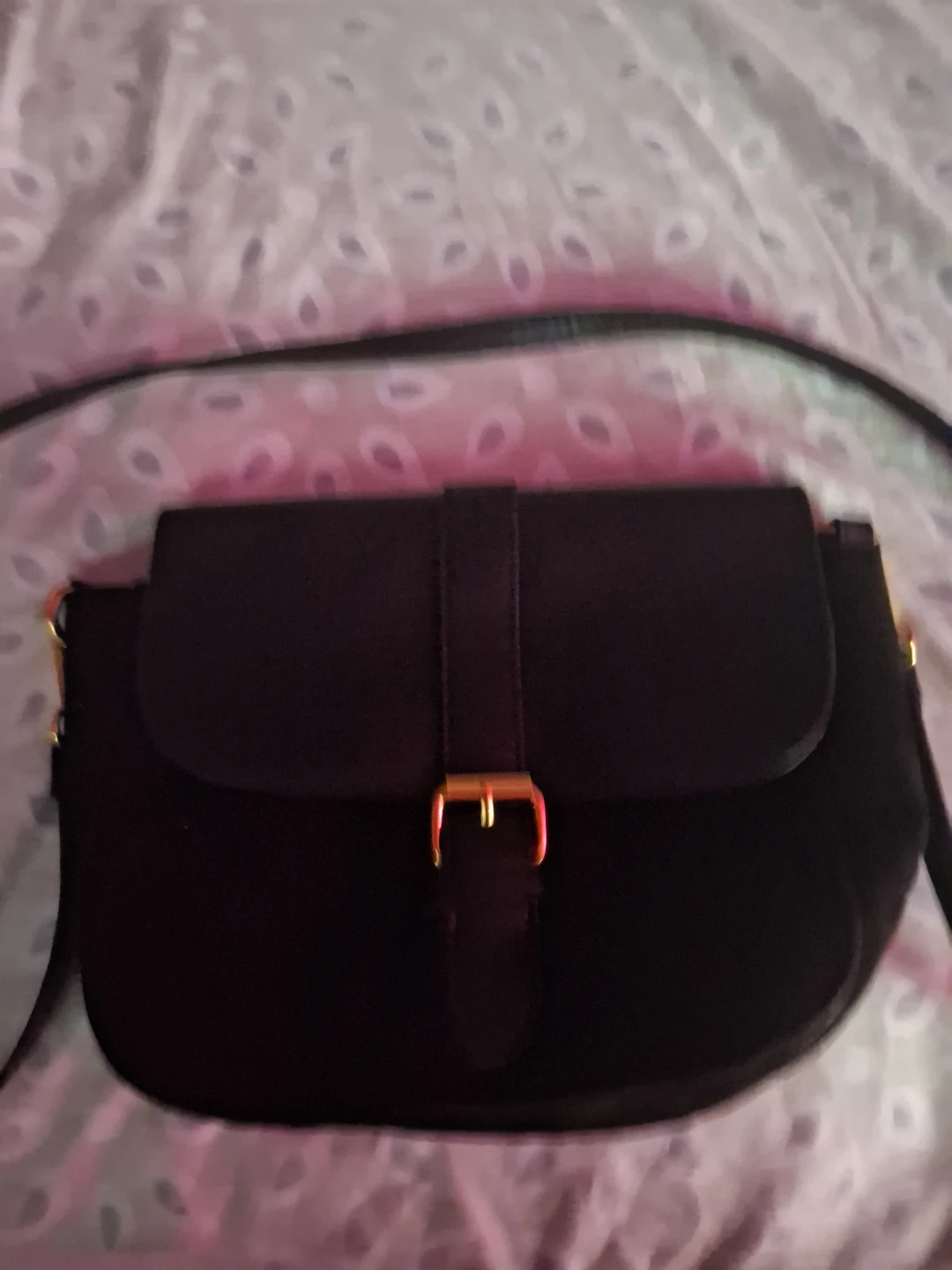 Black crossbody purse with gold buckle