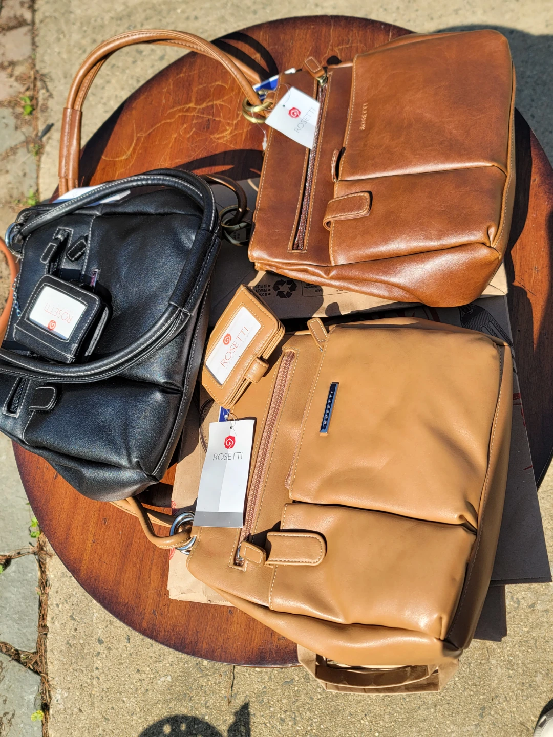 3 Rosetti Handbags - Black, brown and Tan