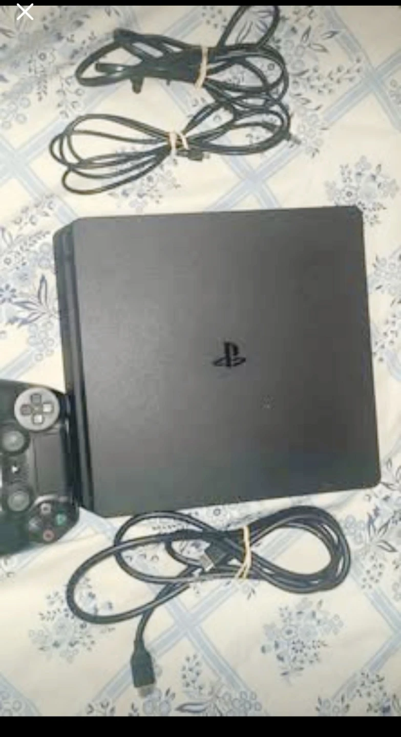 PlayStation 4 Console with Games, Cords and Controller