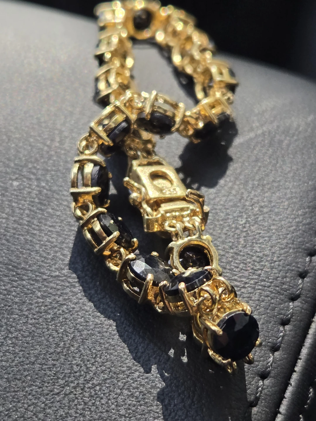 Gold Tone Bracelet with Black Sapphire Stones