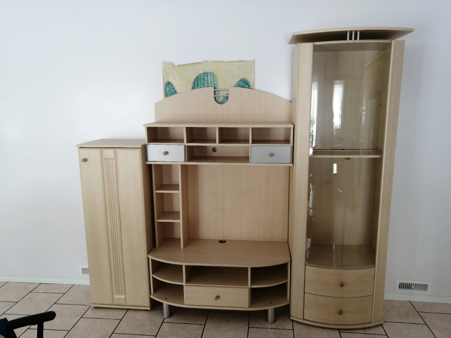 Light wood media unit with display cabinet