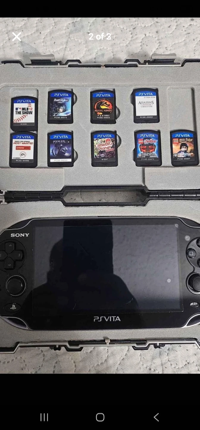 PS Vita  Console with 8 Games - photo 2