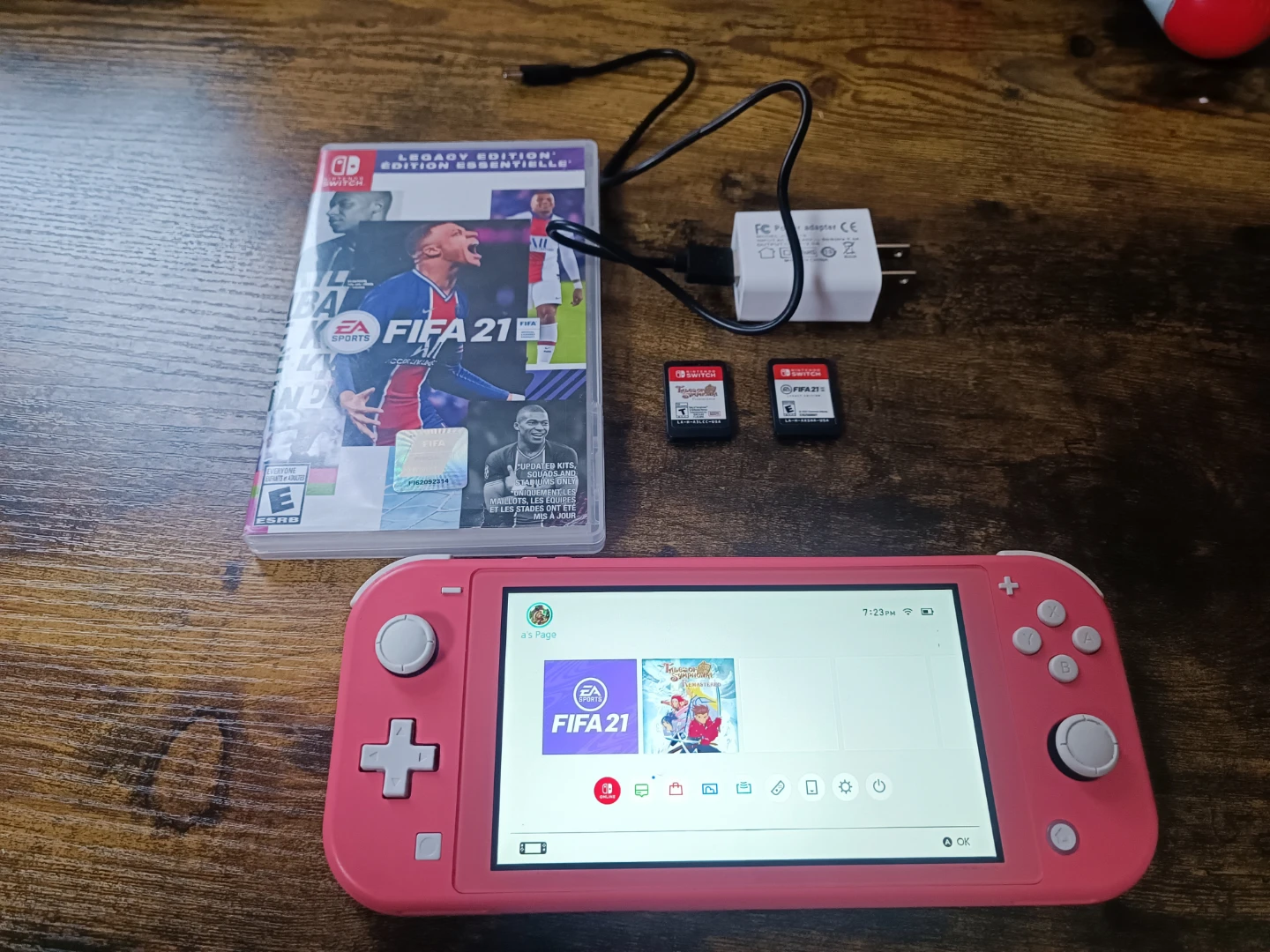 Nintendo Switch Lite Coral with FIFA 21 and Legend of Symphony