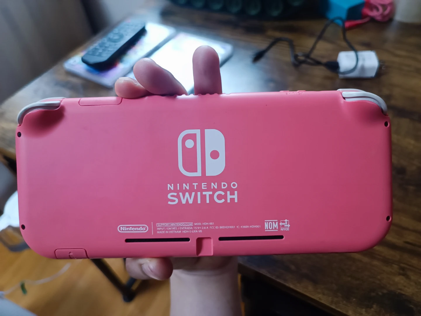 Nintendo Switch Lite Coral with FIFA 21 and Legend of Symphony - photo 4