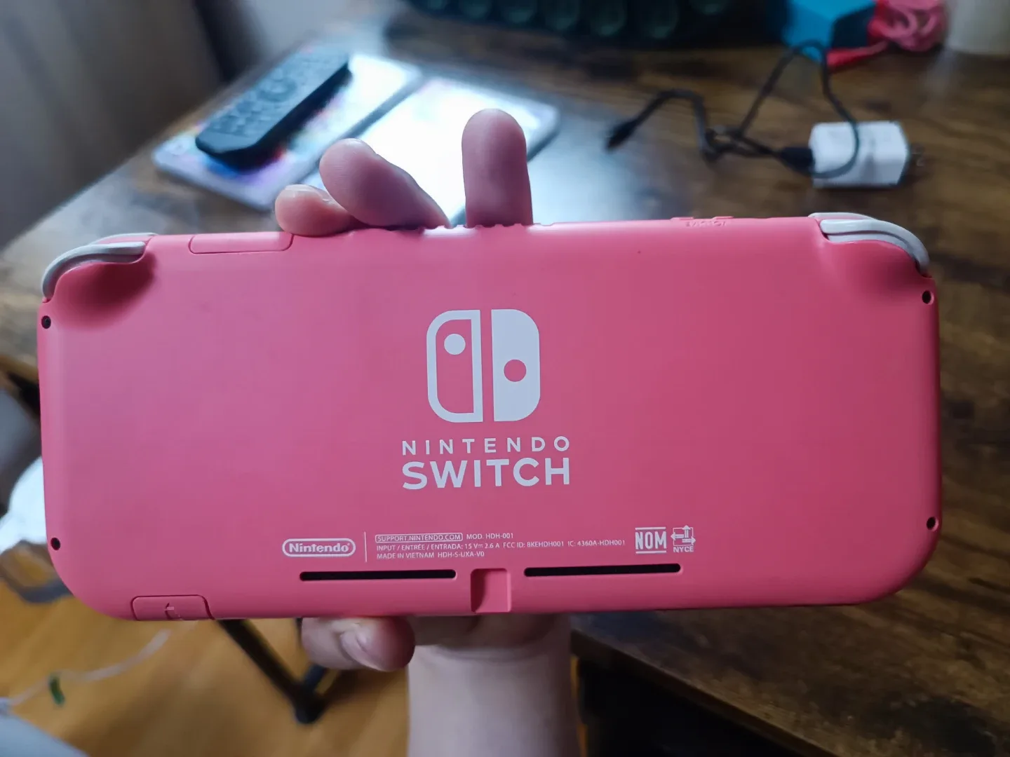 Nintendo Switch Lite Coral with FIFA 21 and Legend of Symphony - photo 4