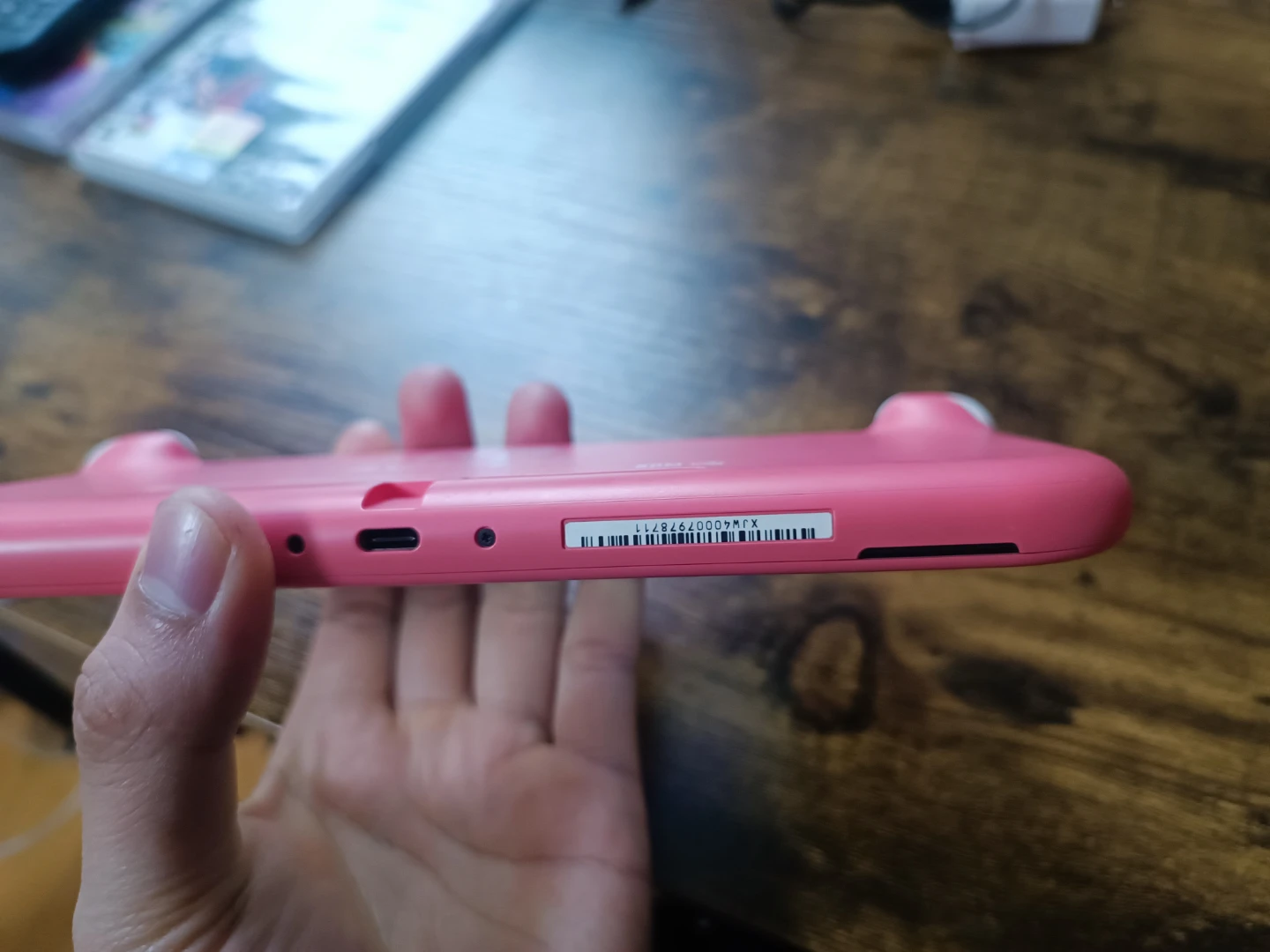 Nintendo Switch Lite Coral with FIFA 21 and Legend of Symphony - photo 5