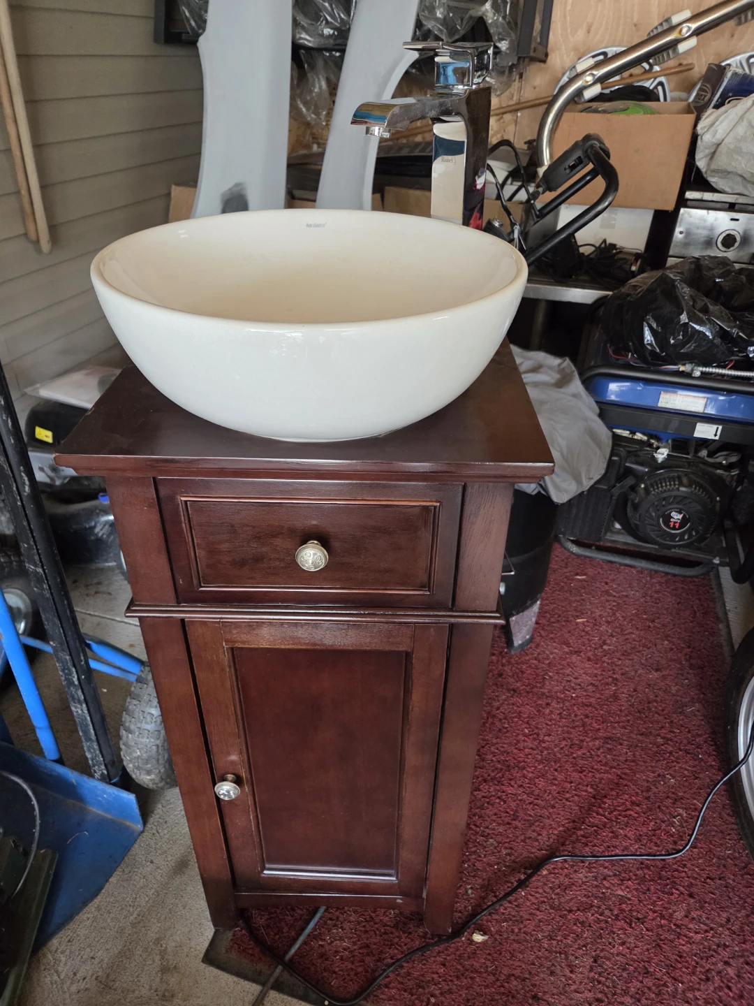 White Vessel Sink with Dark Wood Vanity Cabinet for powder room.
