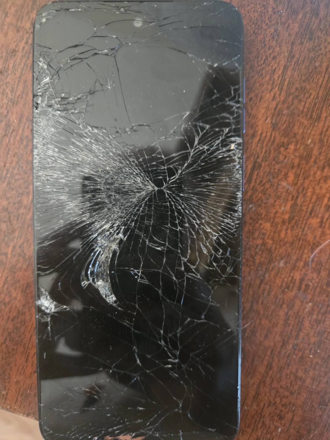 Black Smartphone - Cracked Screen