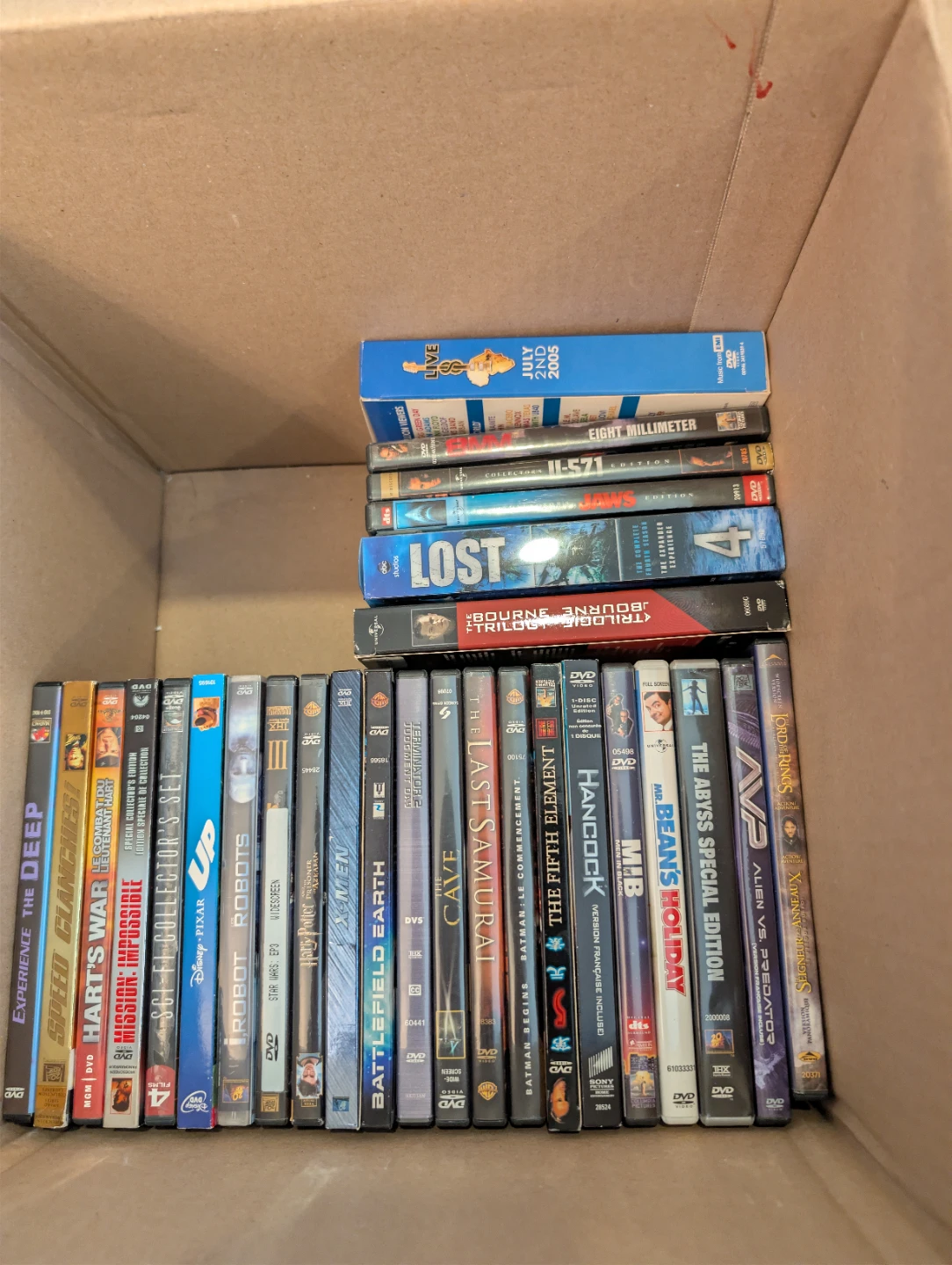 Movie collection, 30+ DVDs including Sci-Fi, Action, and Drama