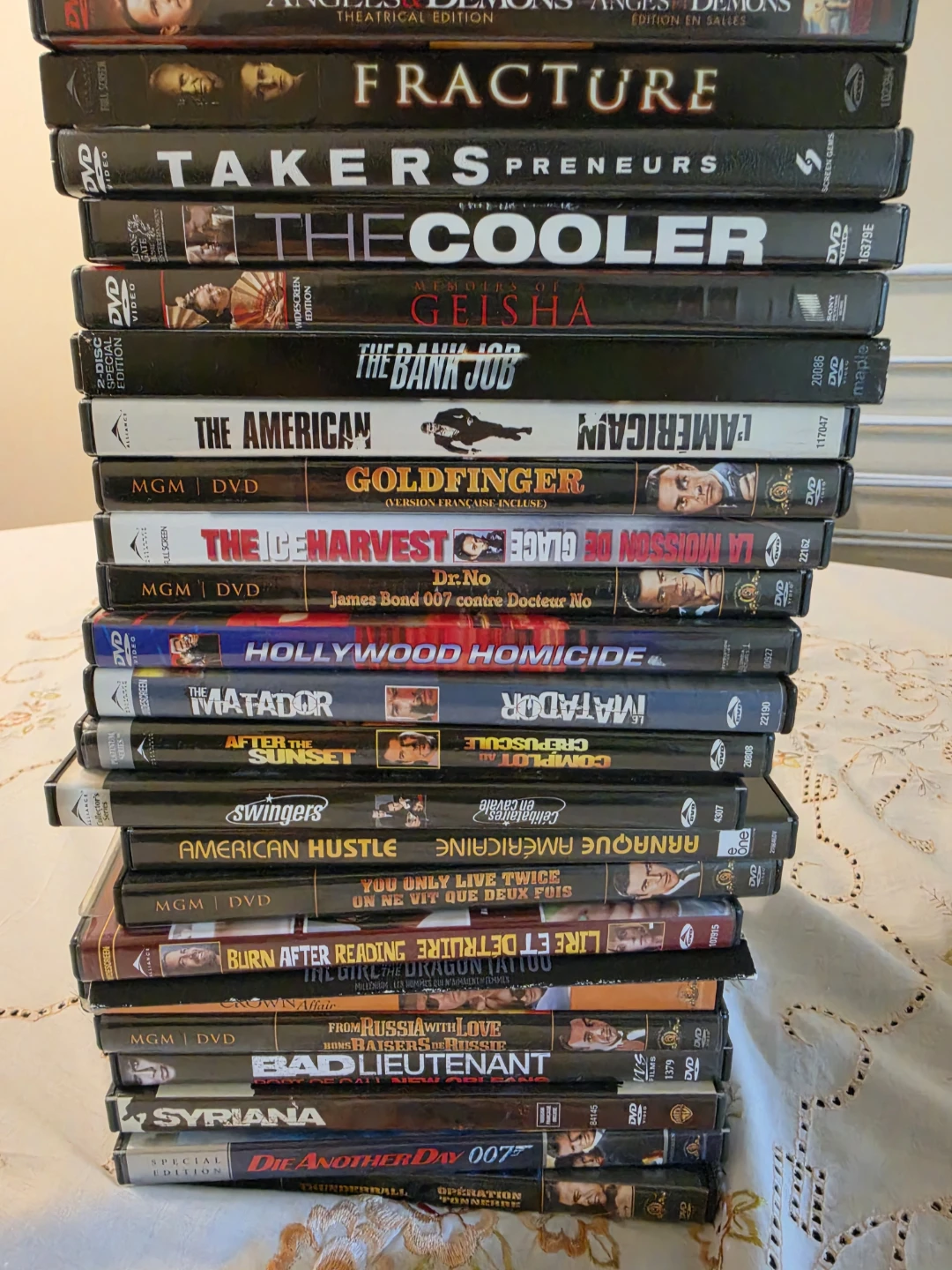 Assorted James Bond and Action Movie DVDs - photo 3