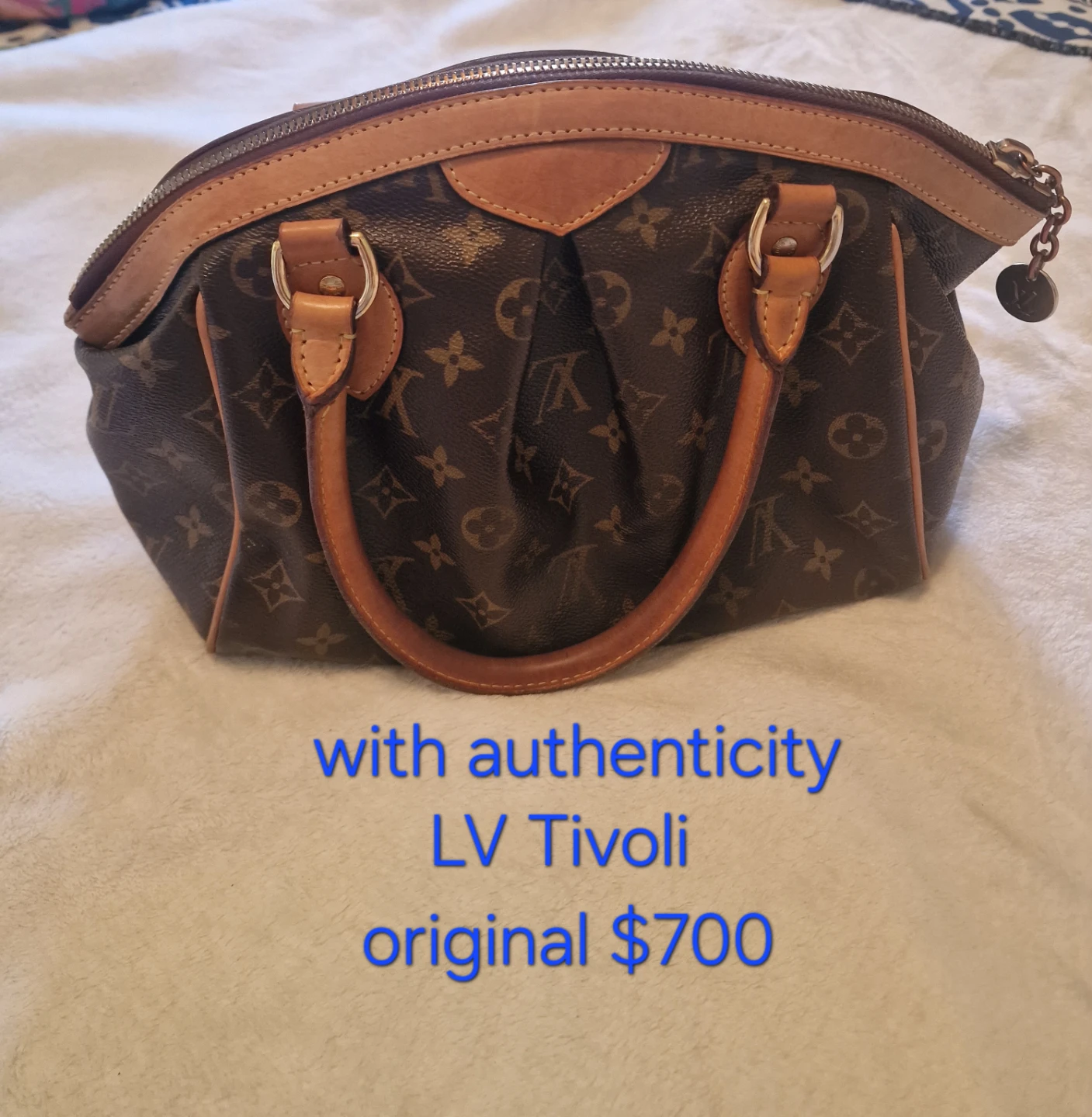 Louis Vuitton Tivoli Handbag