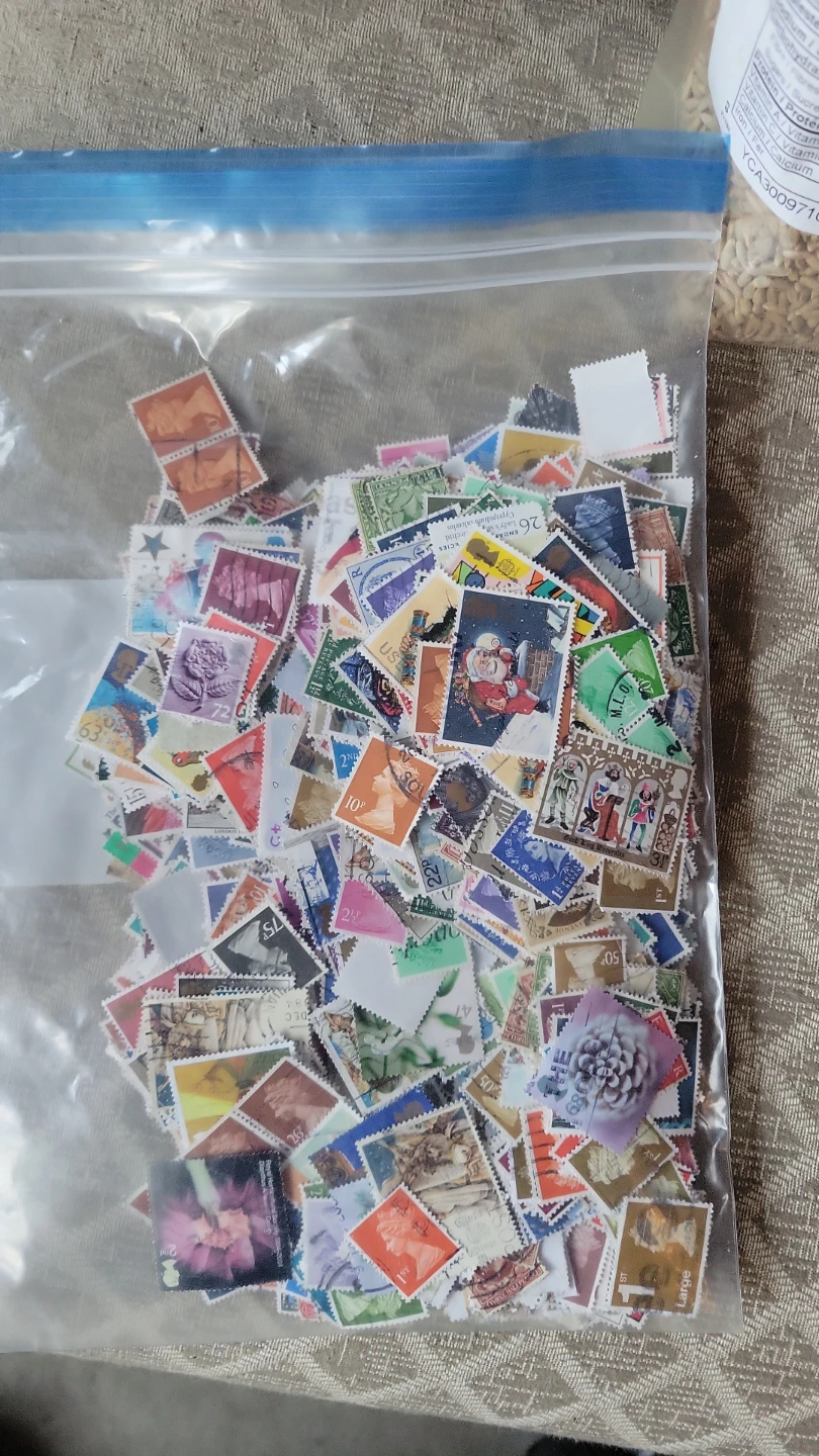 Bag of Great Britain postage stamps
