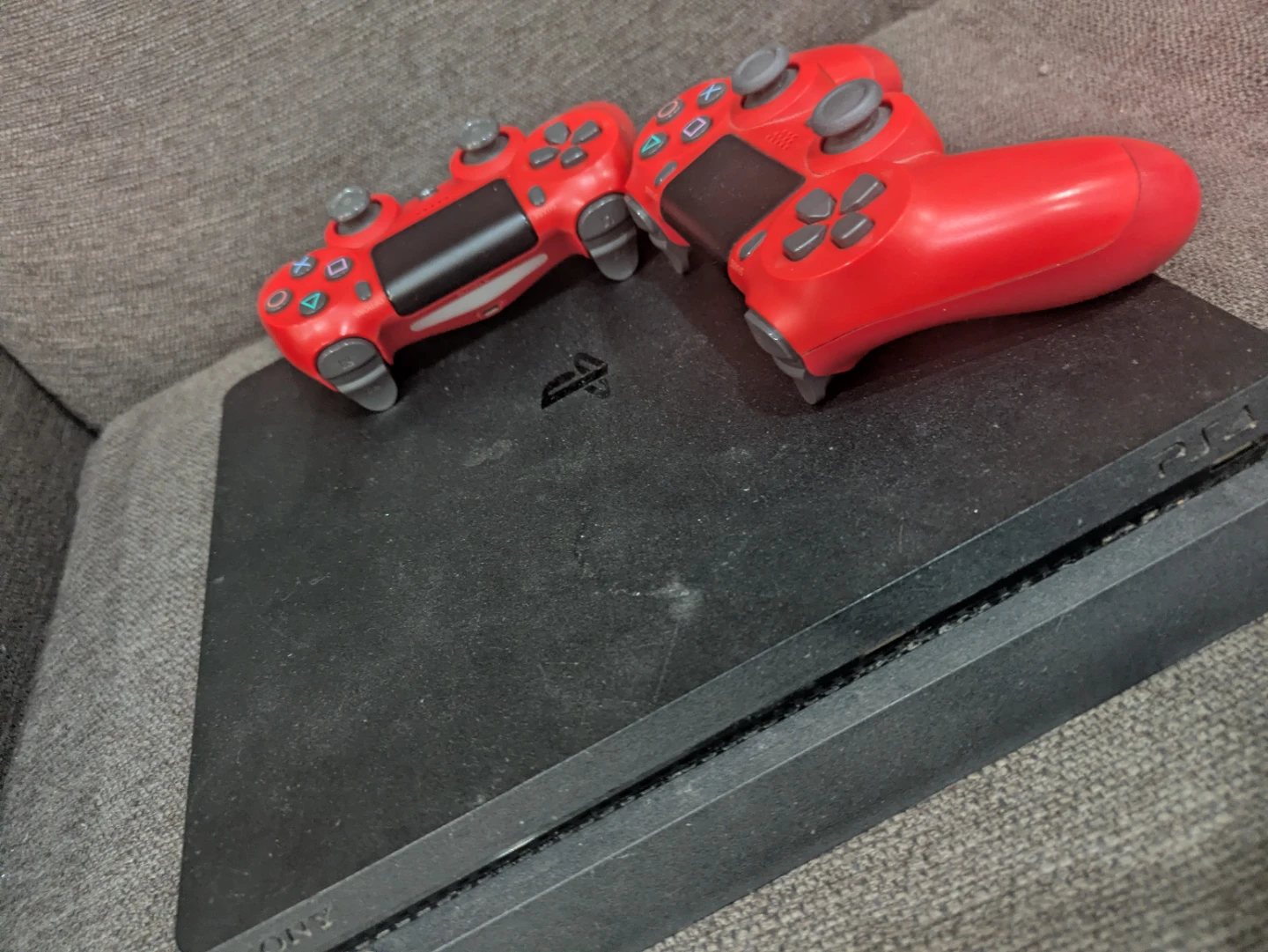 Sony PlayStation 4 slim Console with 2 Red Controllers - photo 2