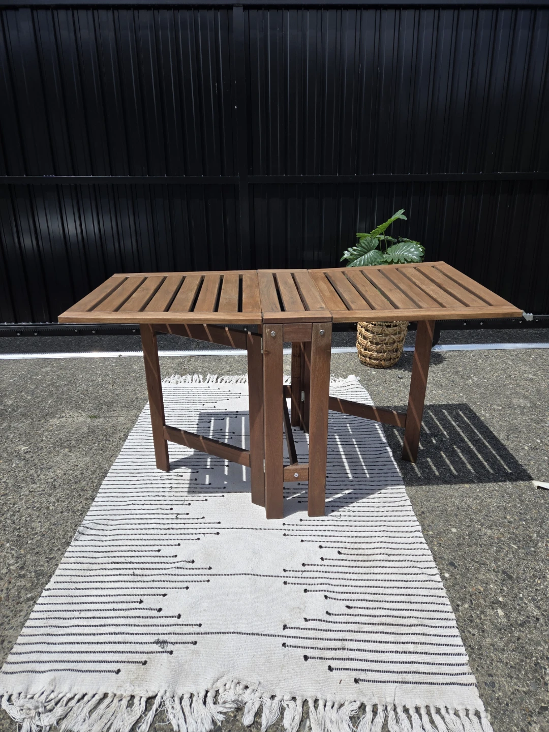 Newly sanded stained Ikea solid wood folding patio table