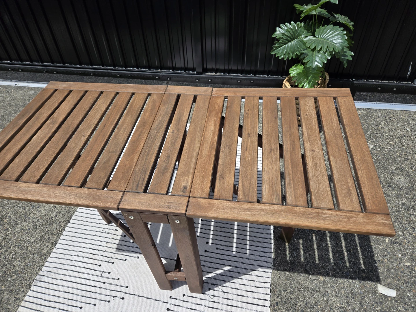 Newly sanded stained Ikea solid wood folding patio table - photo 2