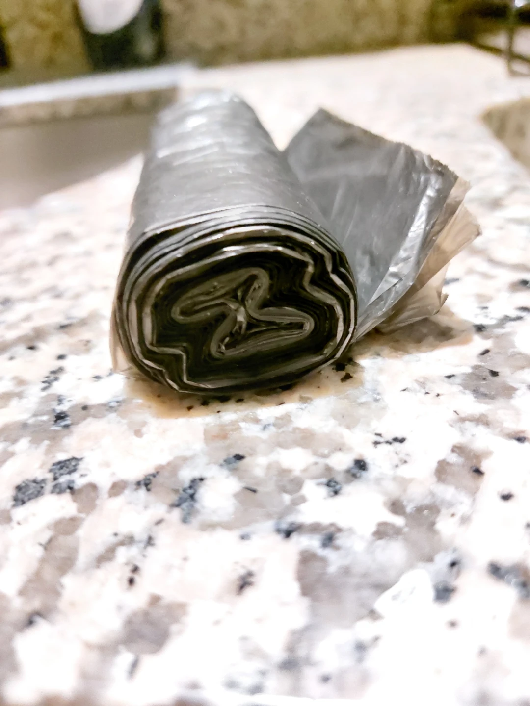 Small roll of black plastic bag