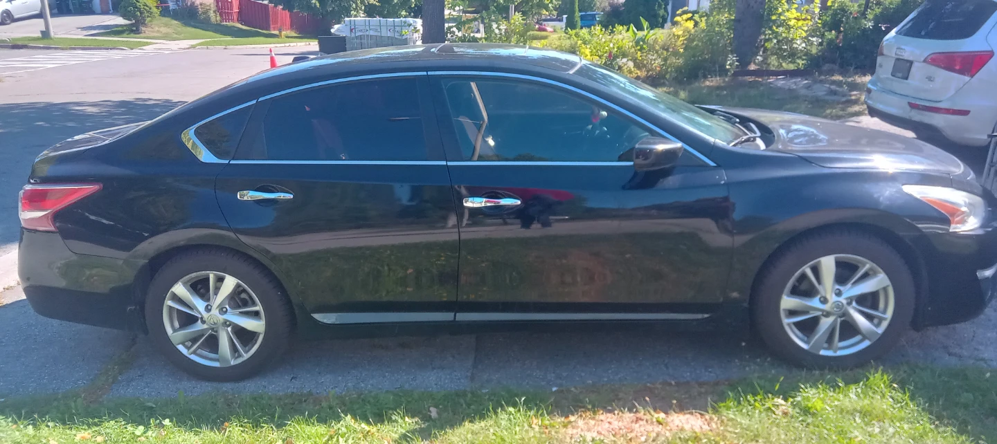 Black Nissan Altima Sedan (Trade For Tesla Please Contact)