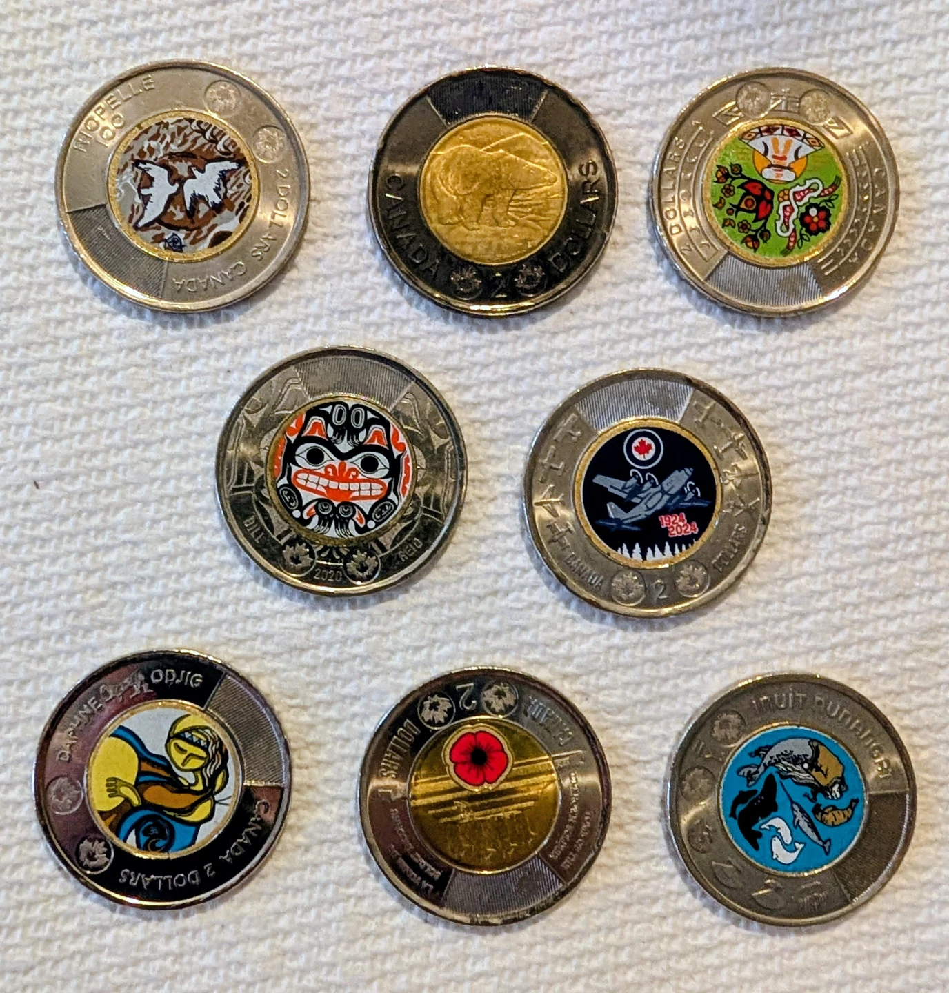 Collection of 8 Canadian $2 Coins - Various Designs
