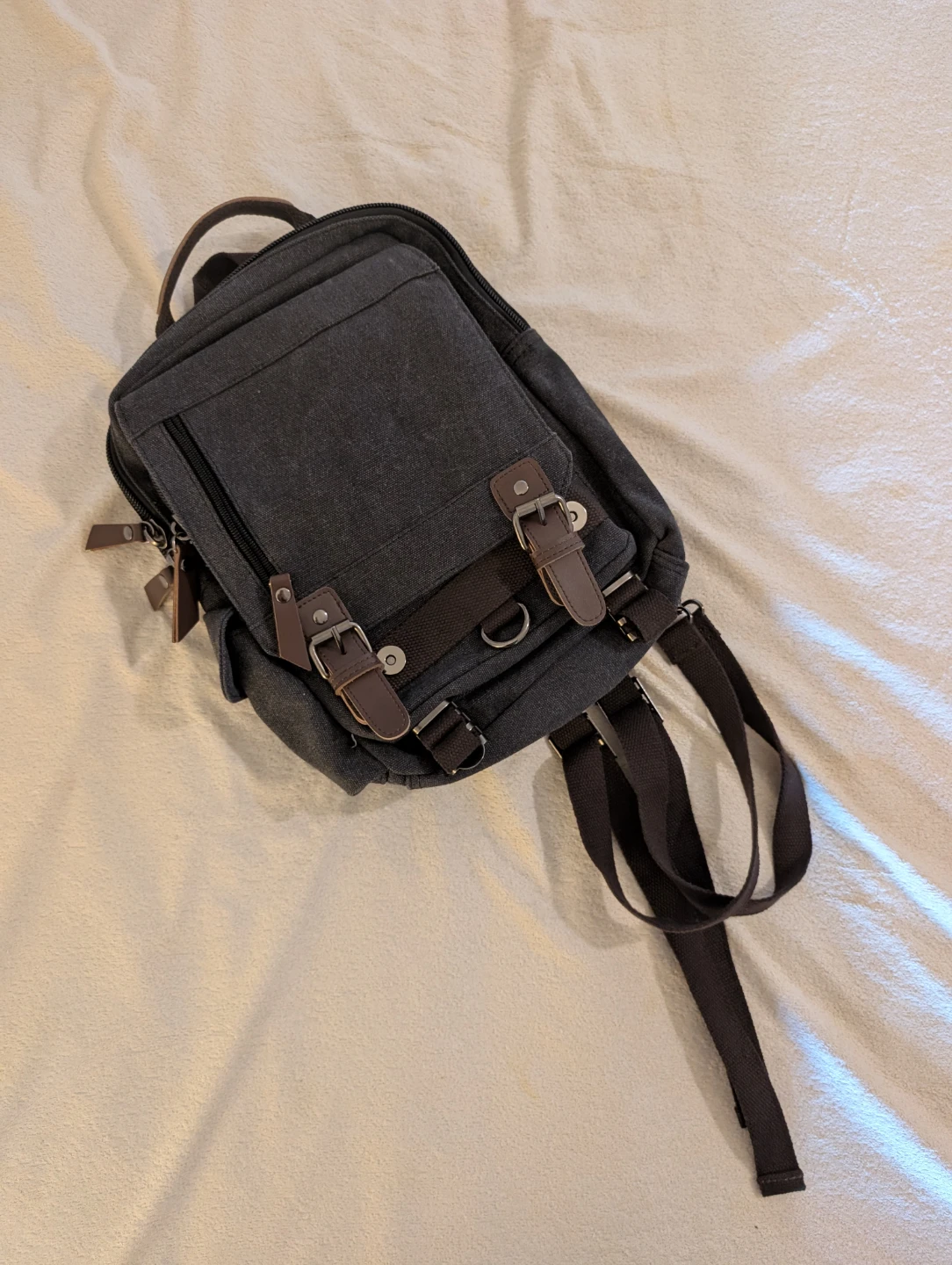Charcoal fabric/brown accent convertible backpack/crossbody