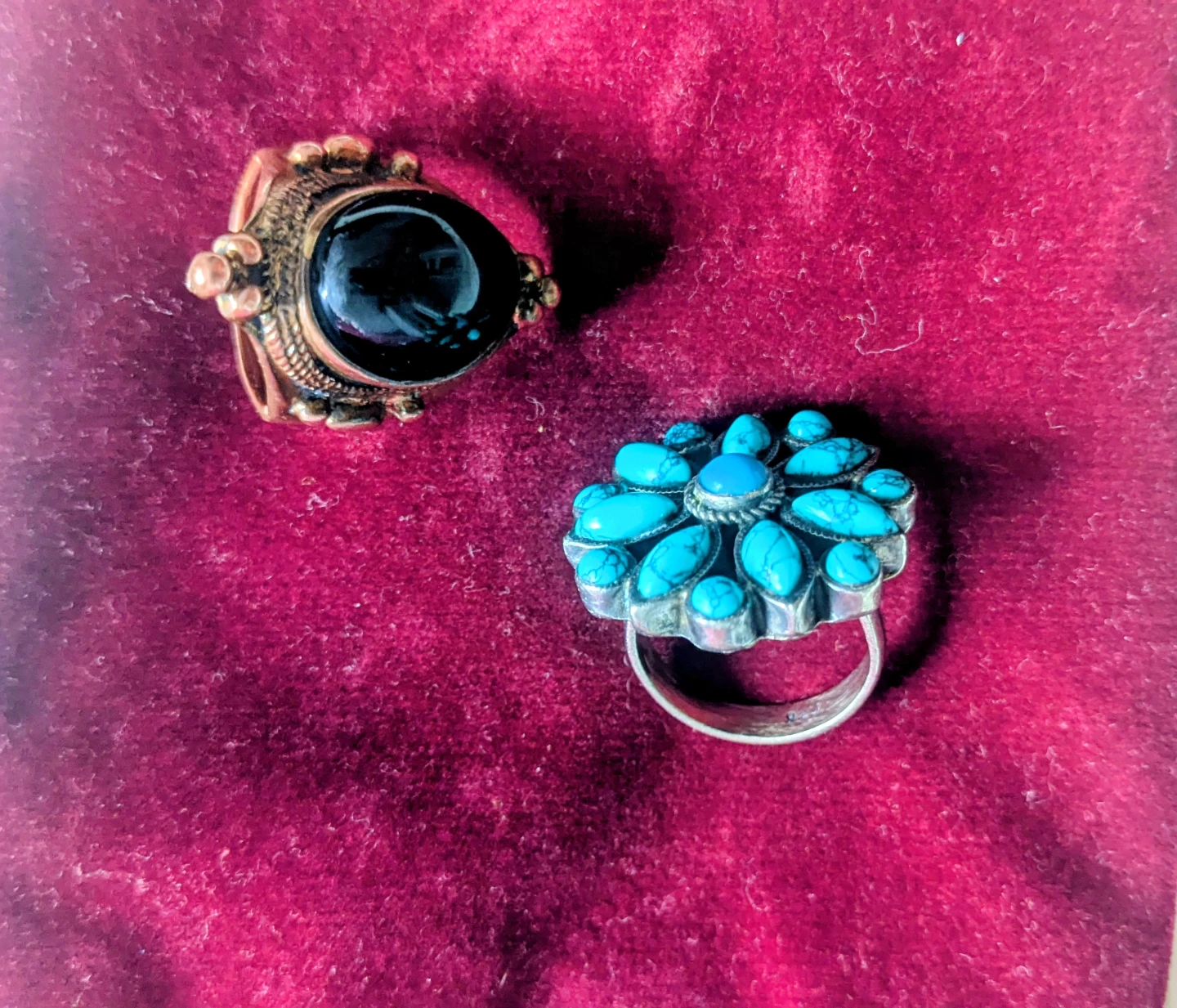 Two rings: black stone and turquoise flower