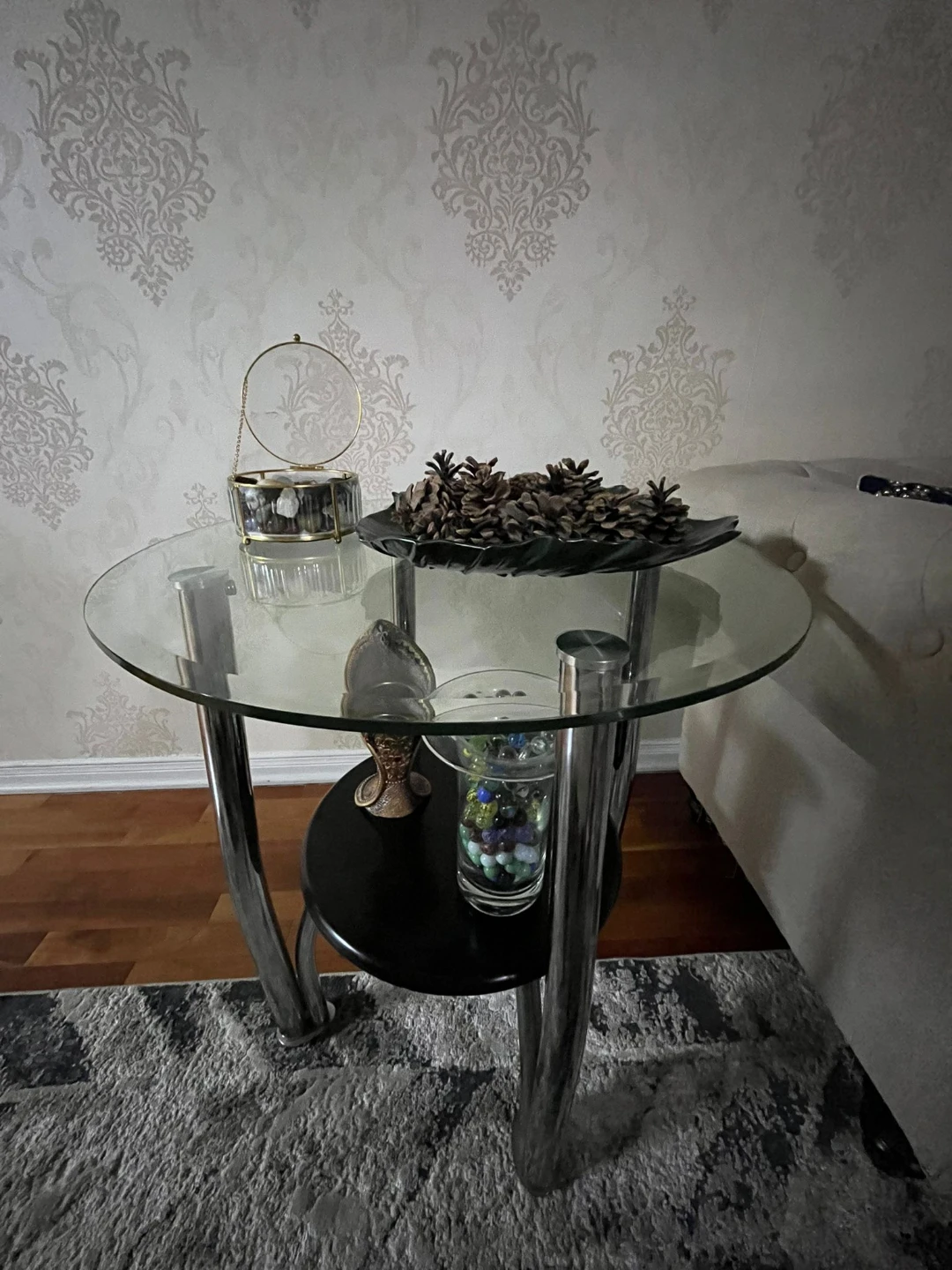 Glass top side table with chrome legs