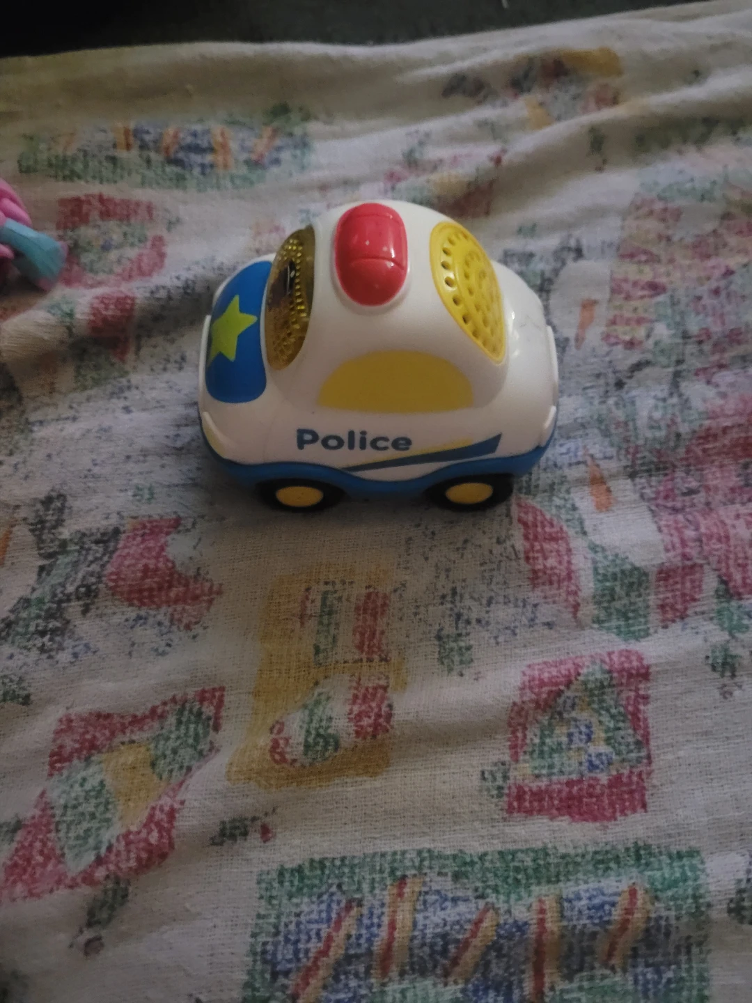 VTech Go! Go! Smart Wheels Police Car toy.
