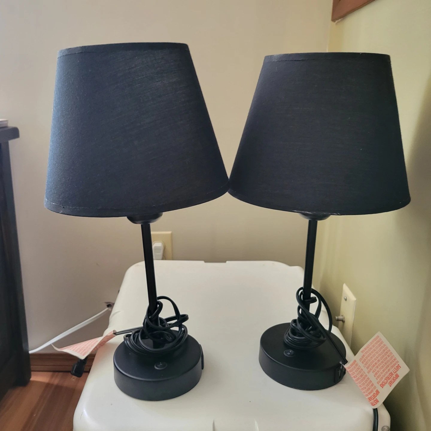 Two black table lamps