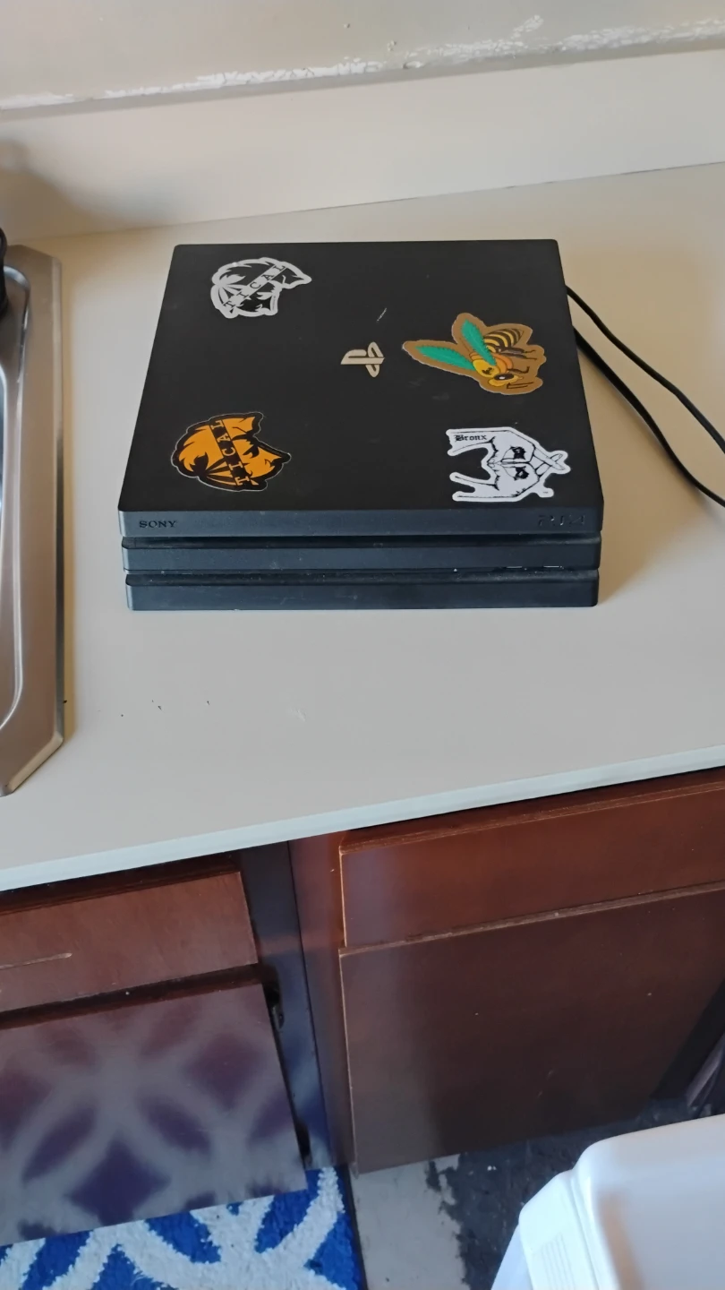 Sony PlayStation 4 Pro Console with 2 Controllers and Games