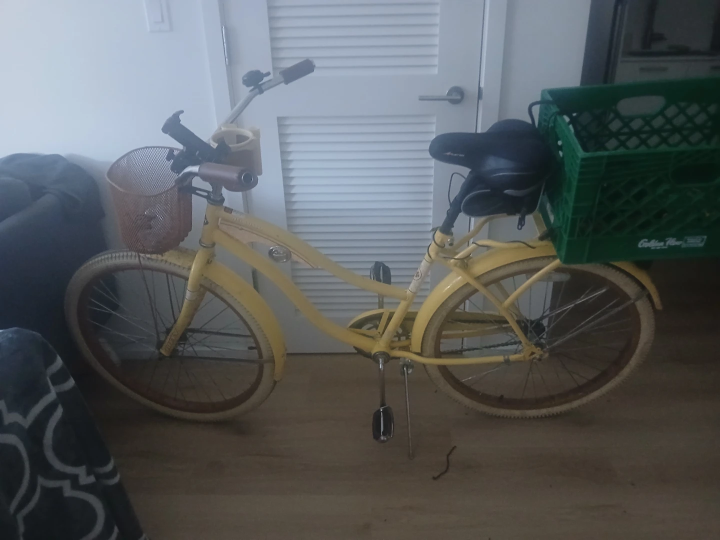 Yellow Cruiser Bicycle with Front Basket and Rear Crate