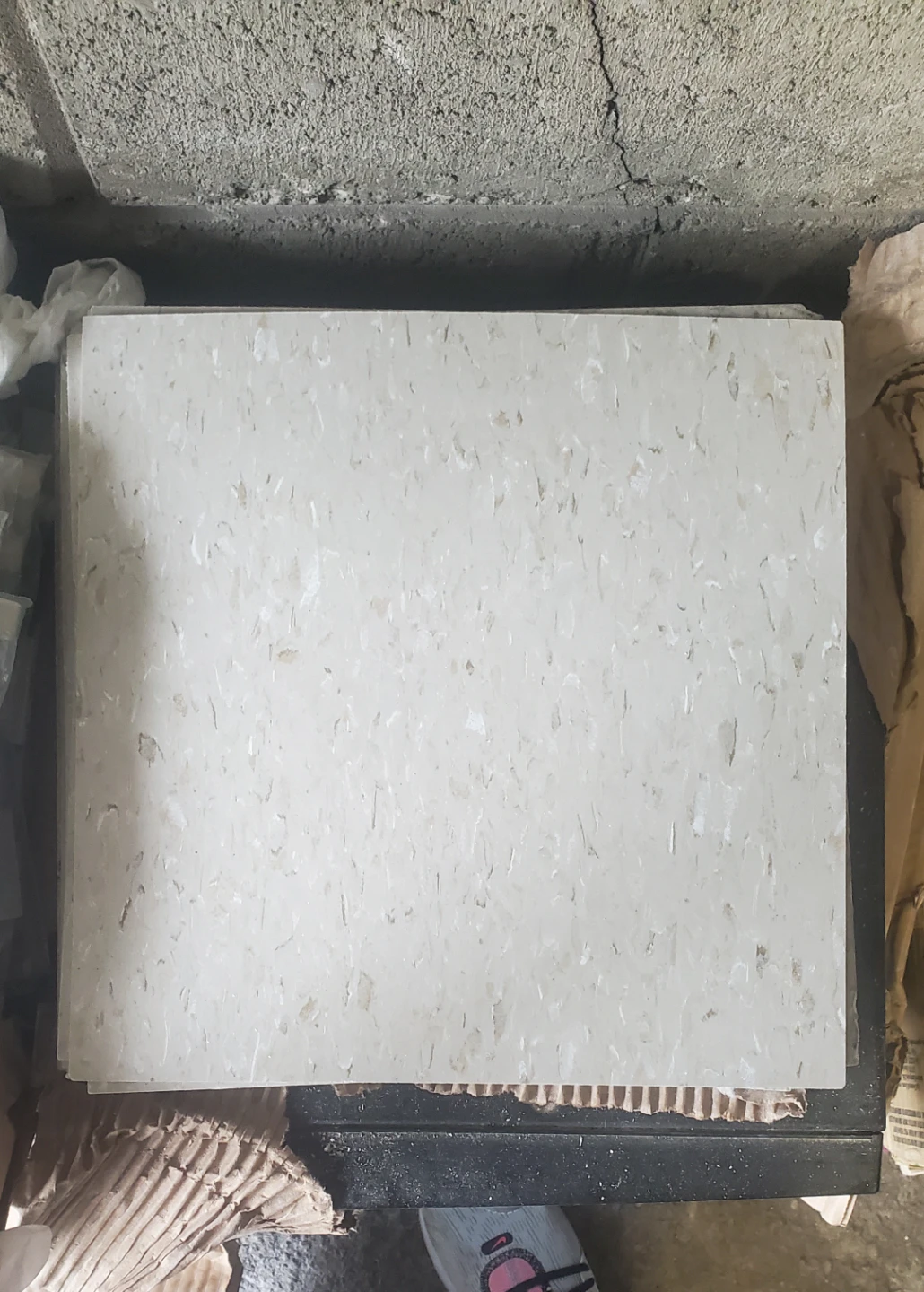 White speckled vinyl floor tiles