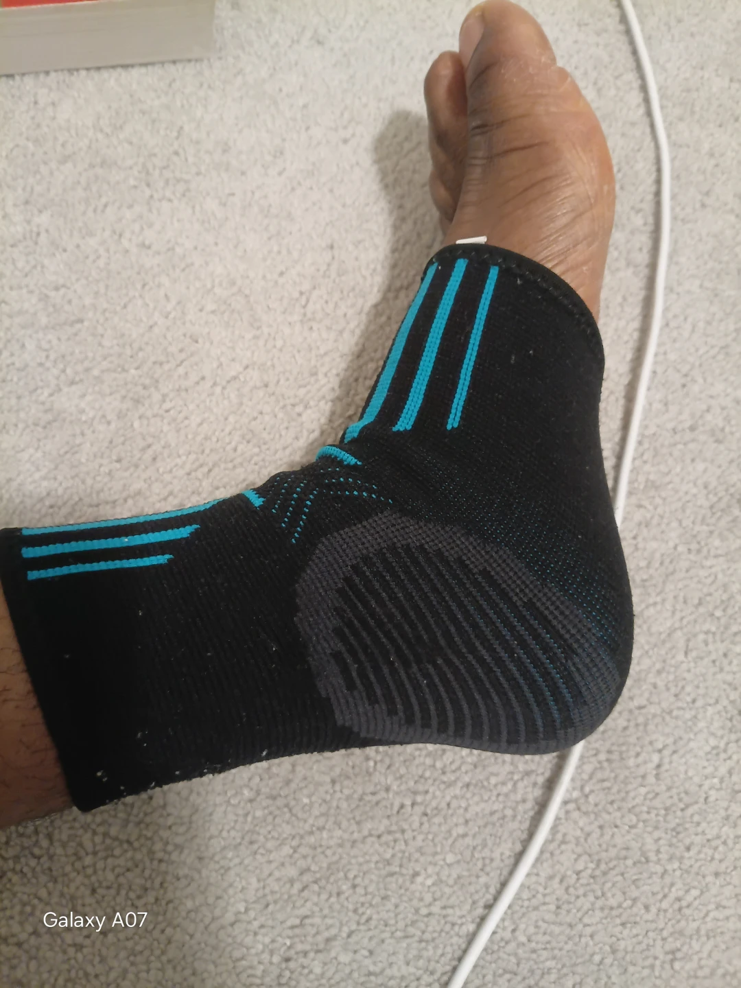 Black and Blue Striped Ankle Brace