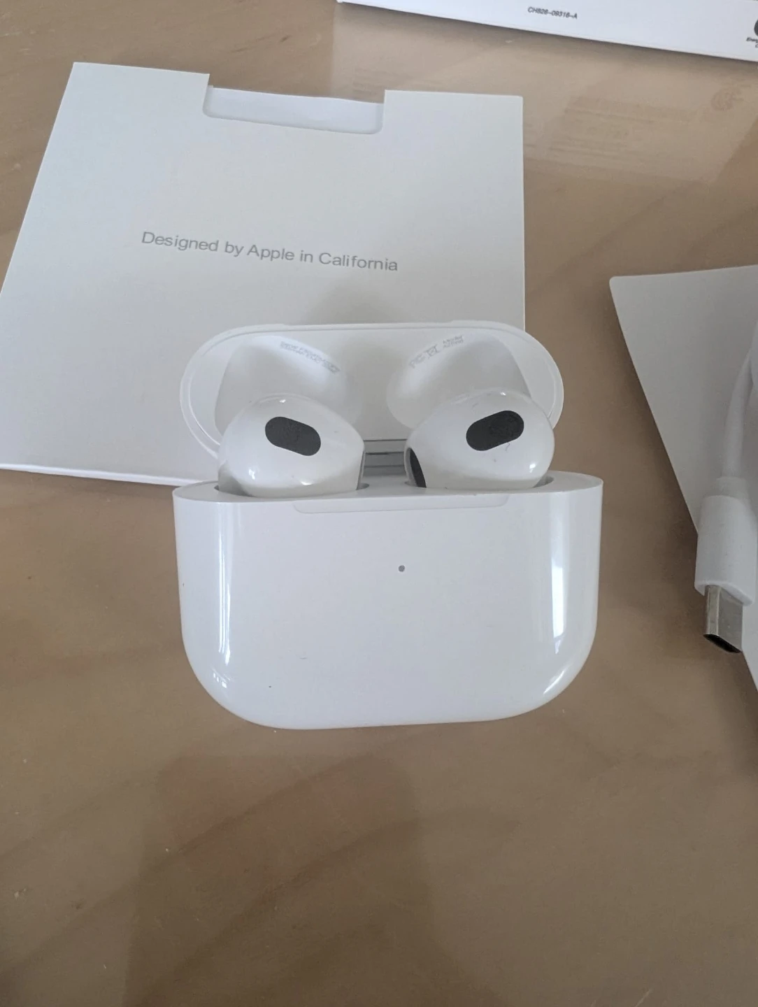 Apple AirPods (3rd generation) with MagSafe Charging Case - photo 3