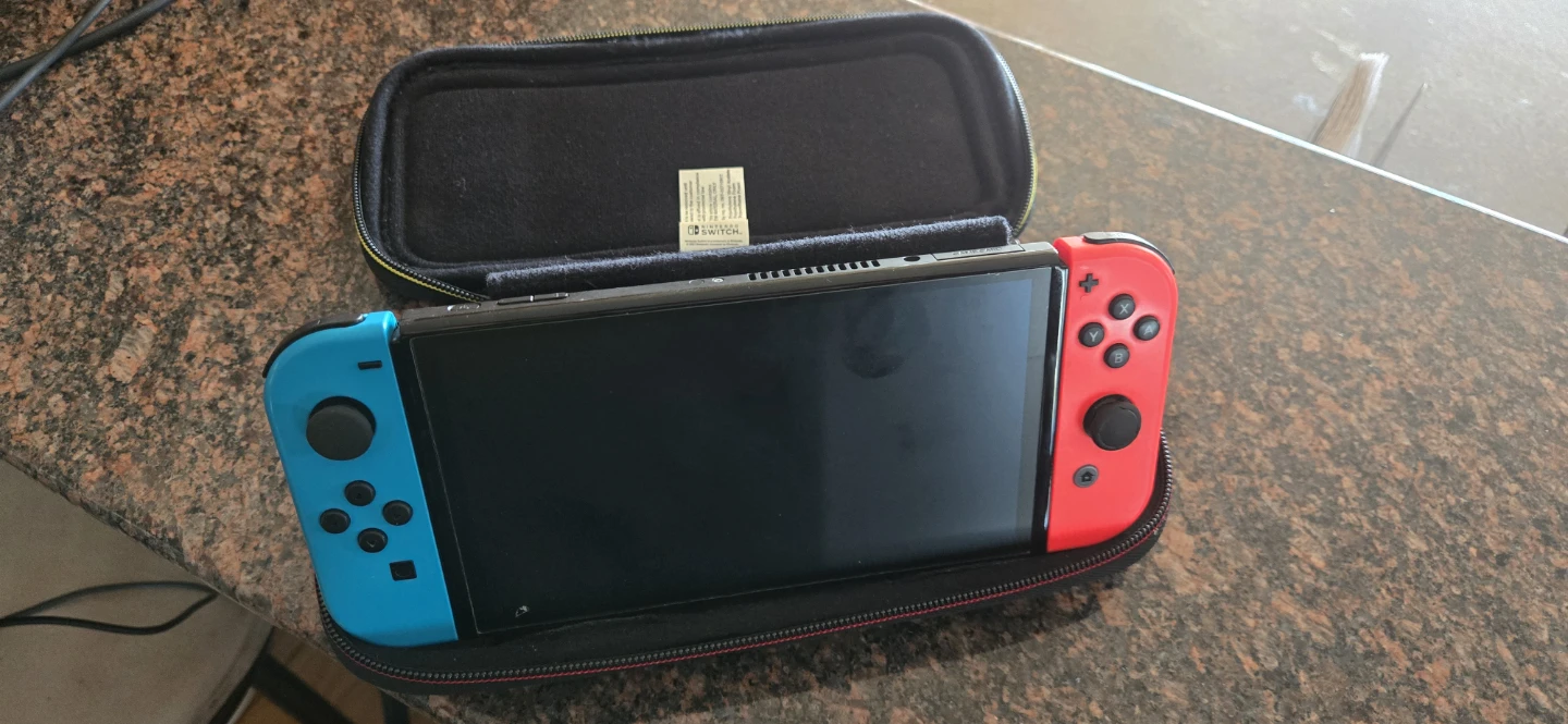 Nintendo Switch Console with Accessories and Game - photo 2