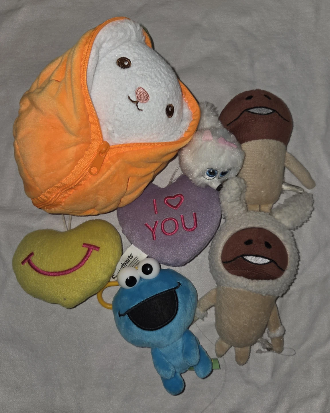 Assorted Plush Toys - Cookie Monster, Hearts, and More