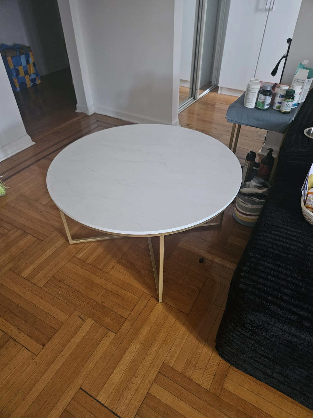 White Round Coffee Table with Gold Legs