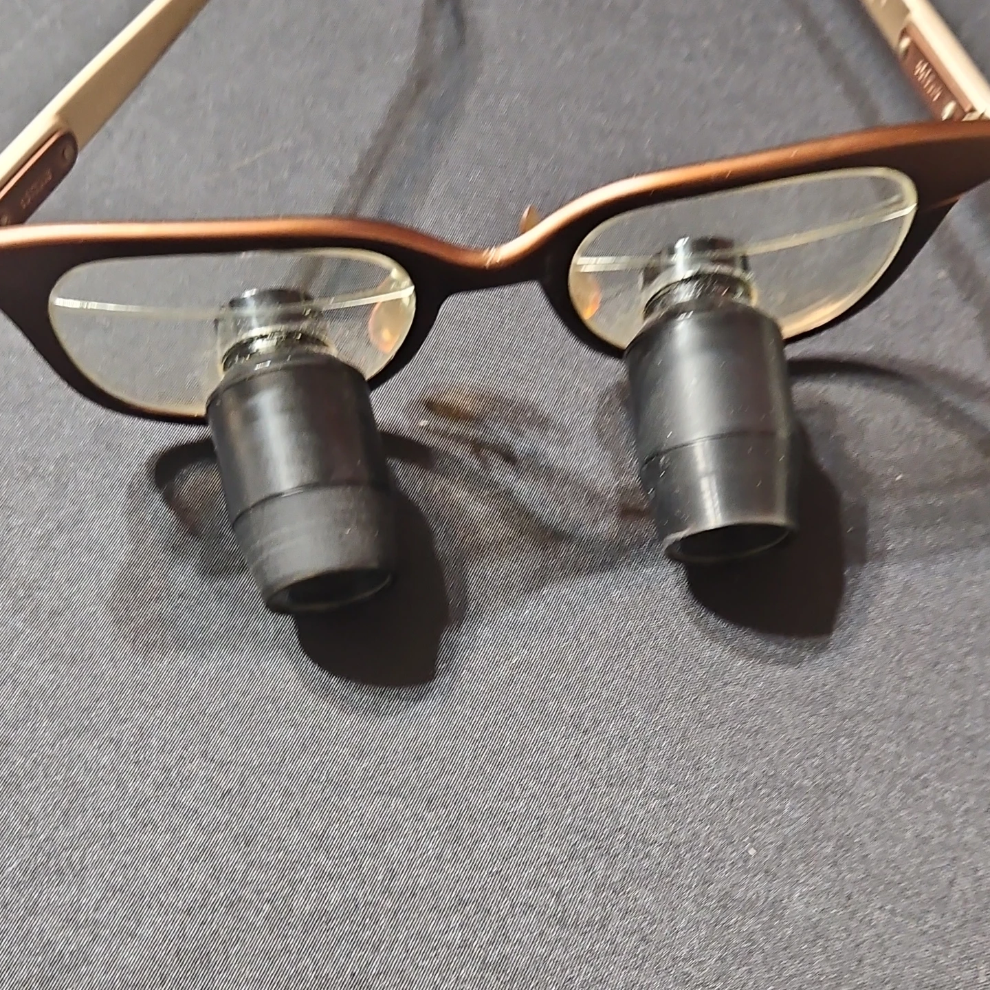 Surgical protective glasses with magnifying Loupes