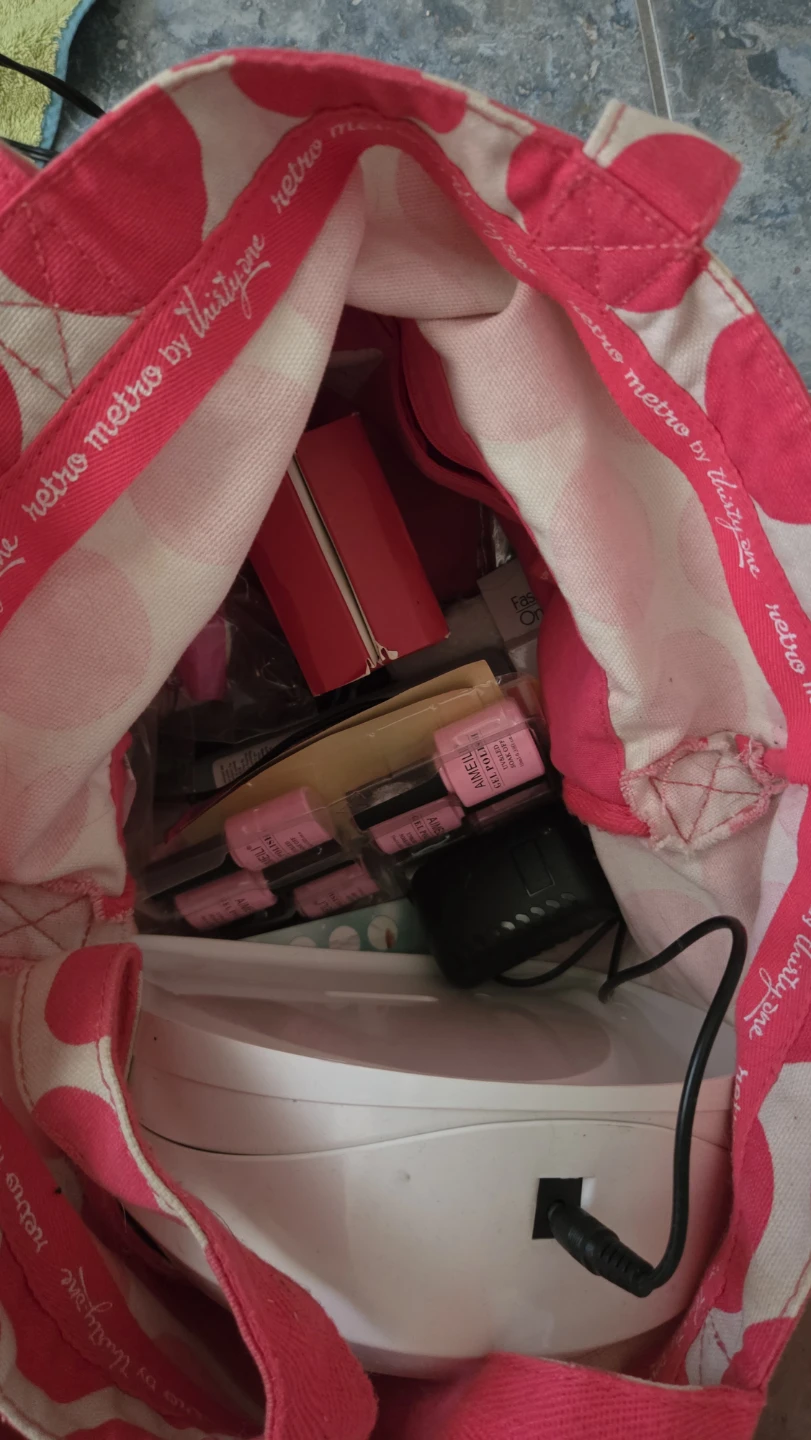 Bag full of nail polish and UV light