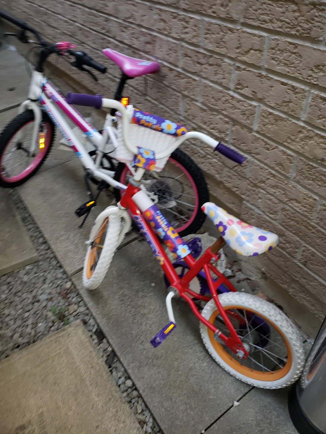Two Kids' Bikes - One Pink & White, One Red & Purple