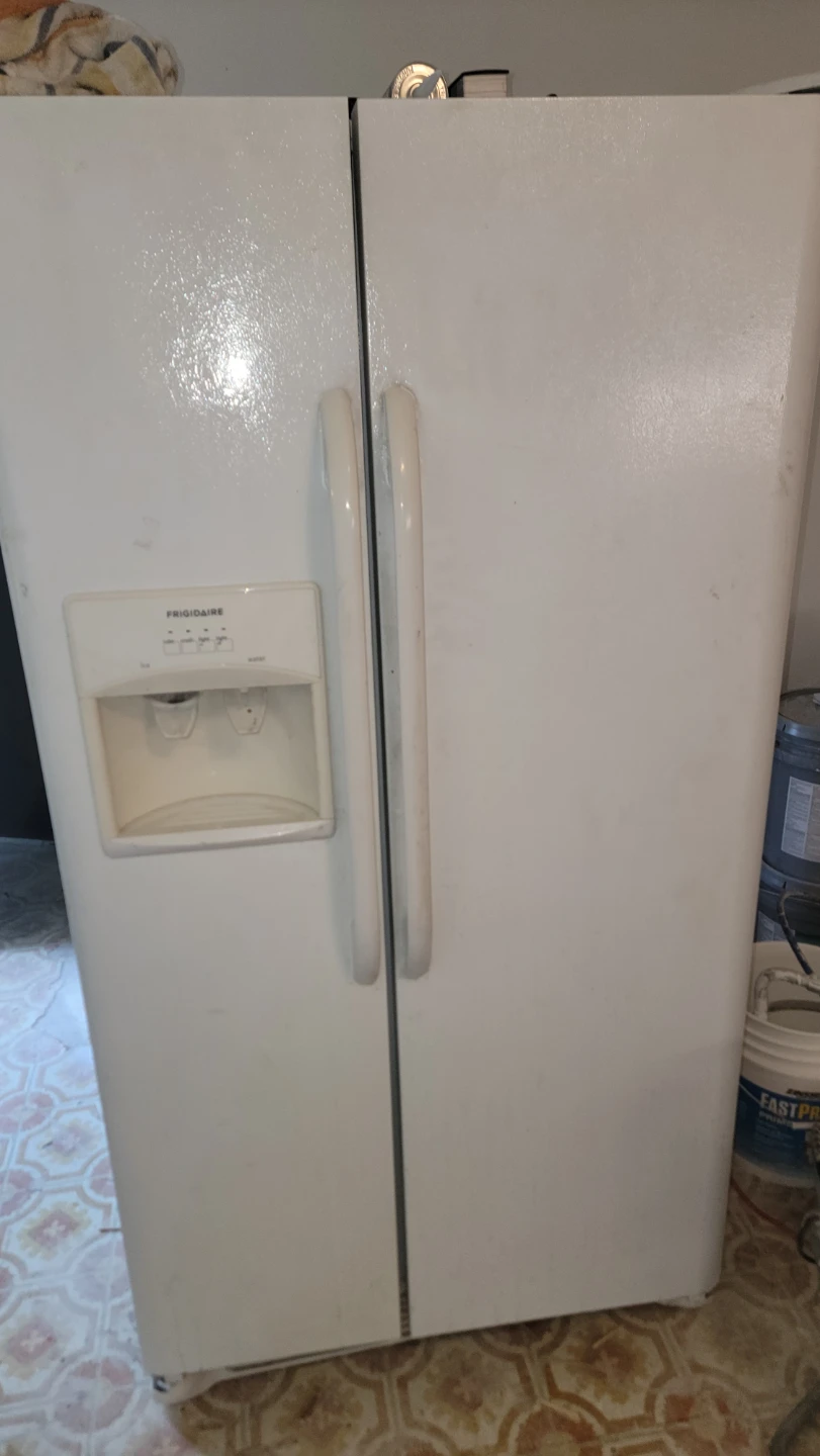 White Frigidaire Refrigerator with Water Dispenser
