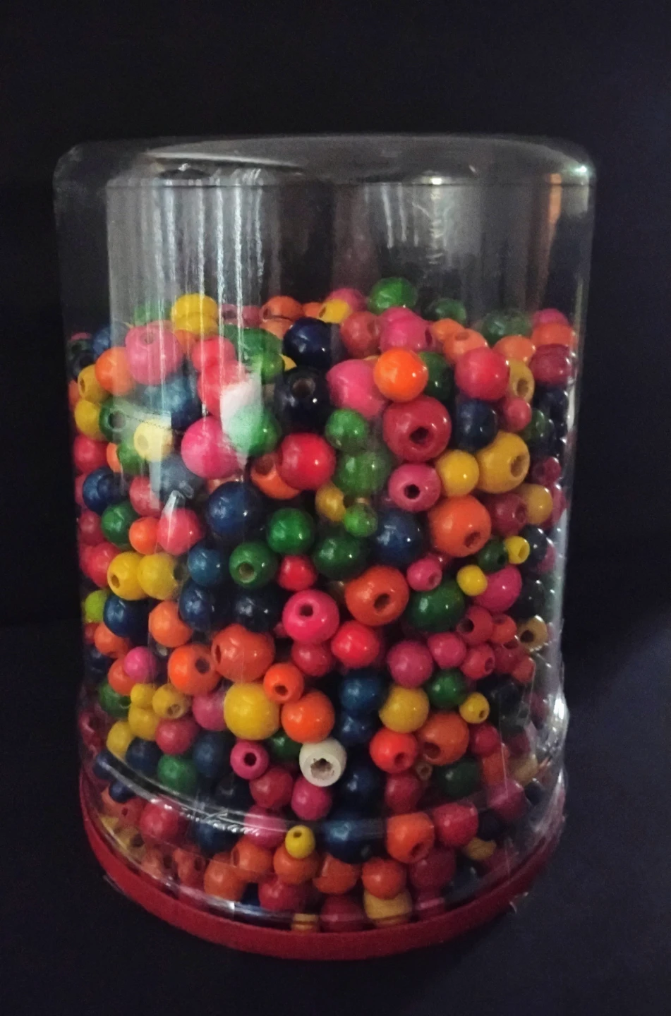 ASSORTMENT OF COLORFUL WOOD BEADS