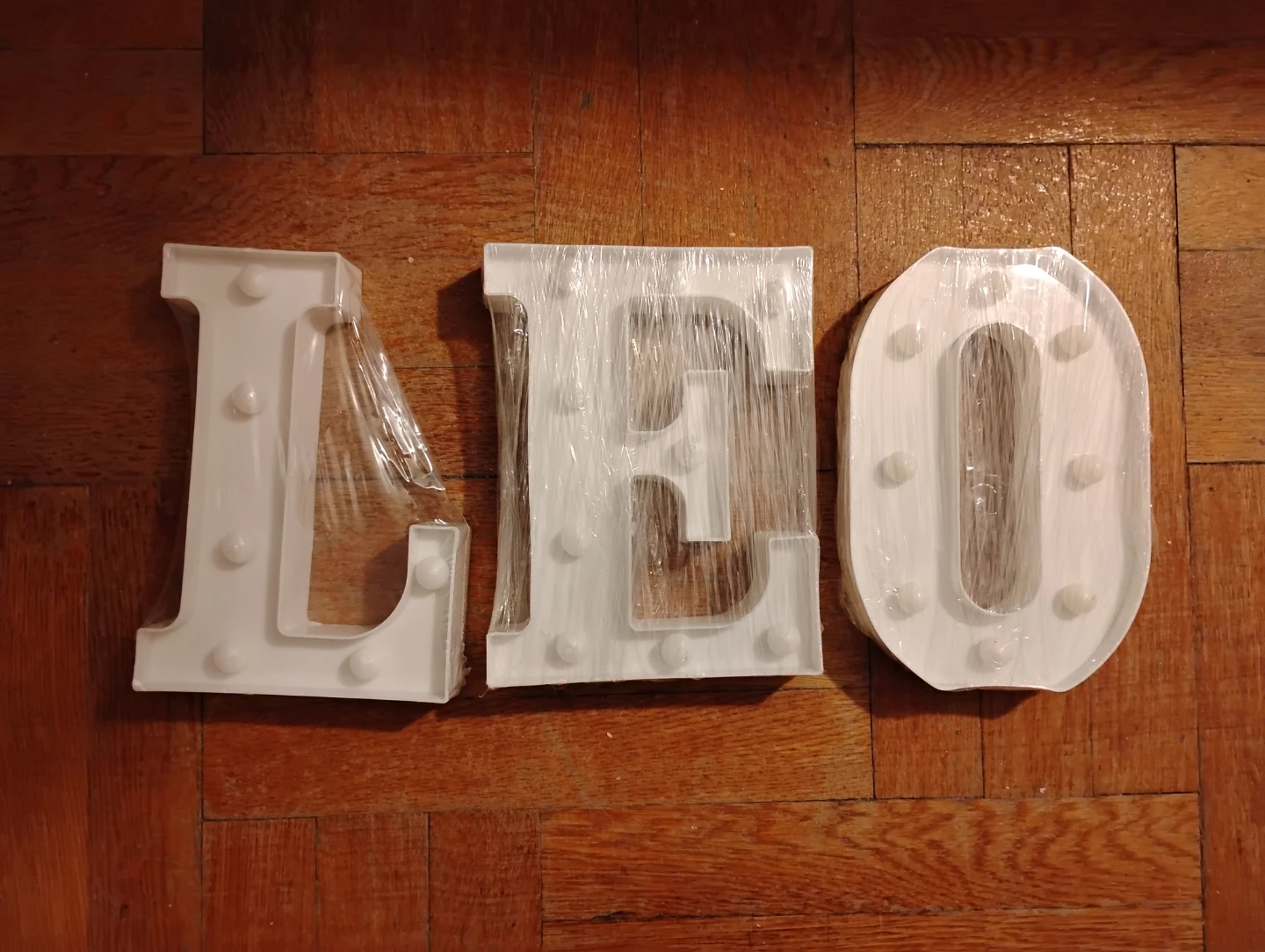 Neon light letters 'LEO"