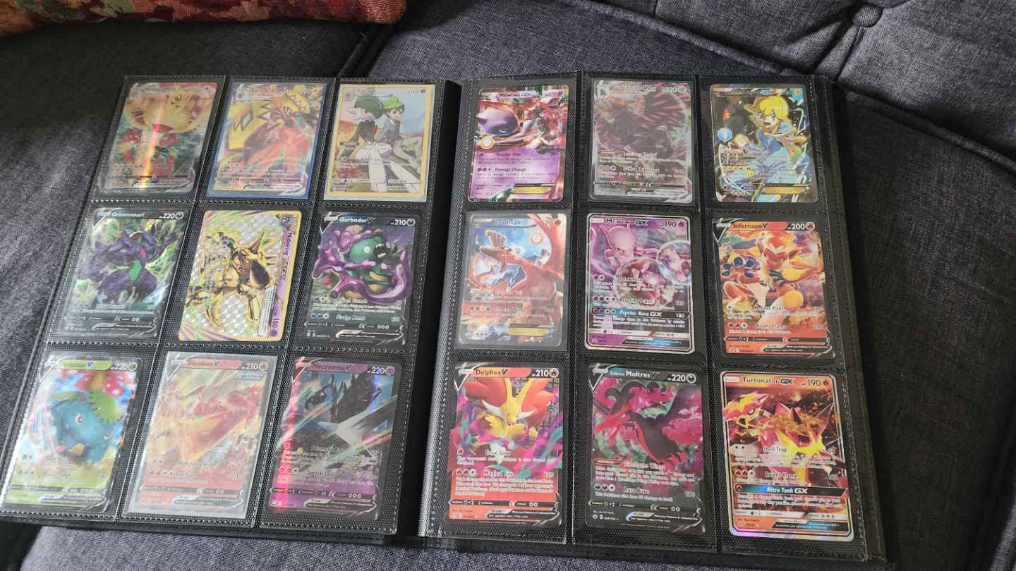 Pokemon Trading Card Binder with over 100 cards included!