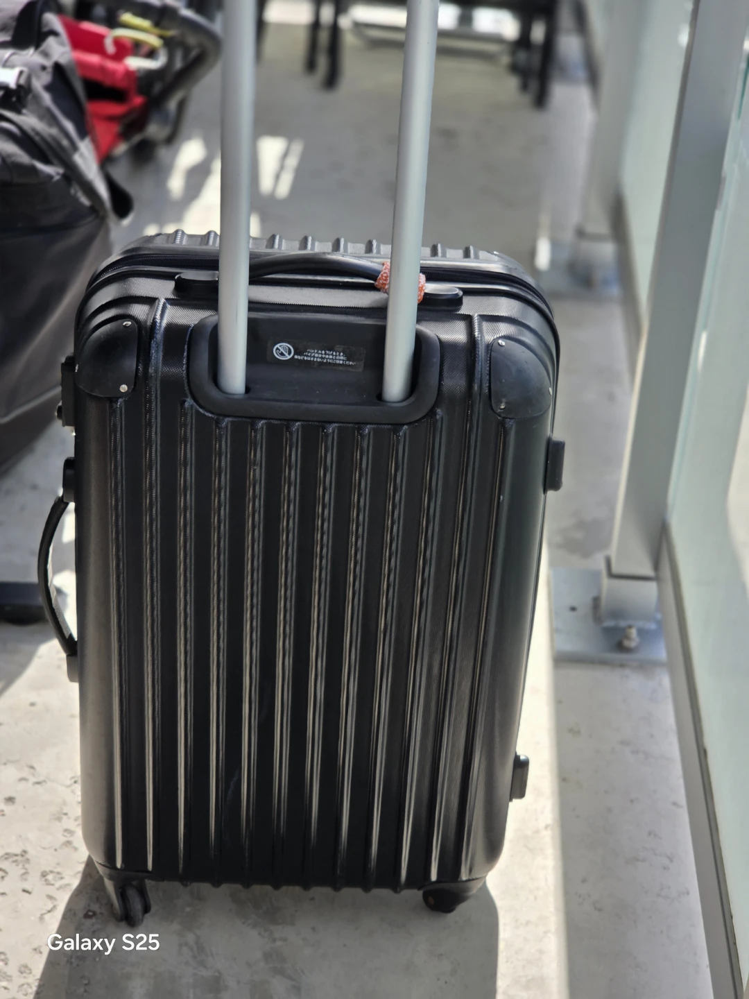 Black Hard-shell Carry-on Suitcase