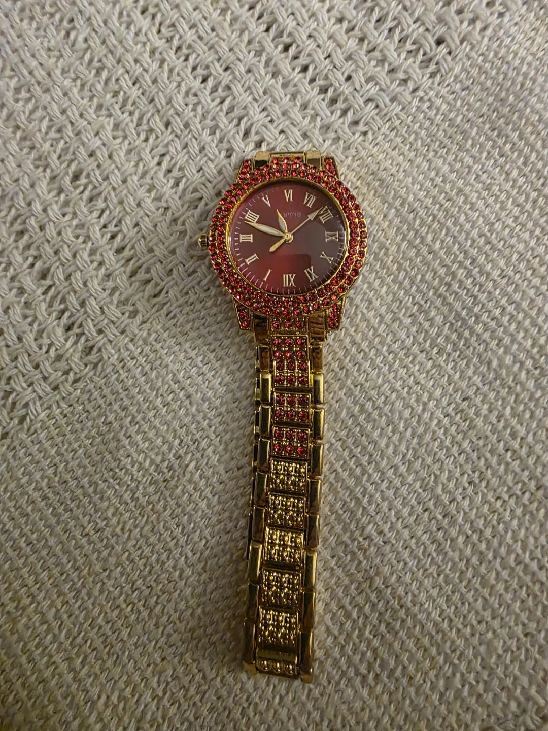 Gold-tone watch with red stones - photo 2