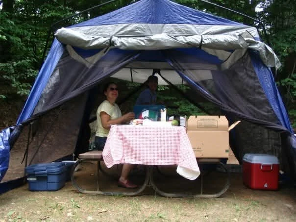 Blue and white camping shelter