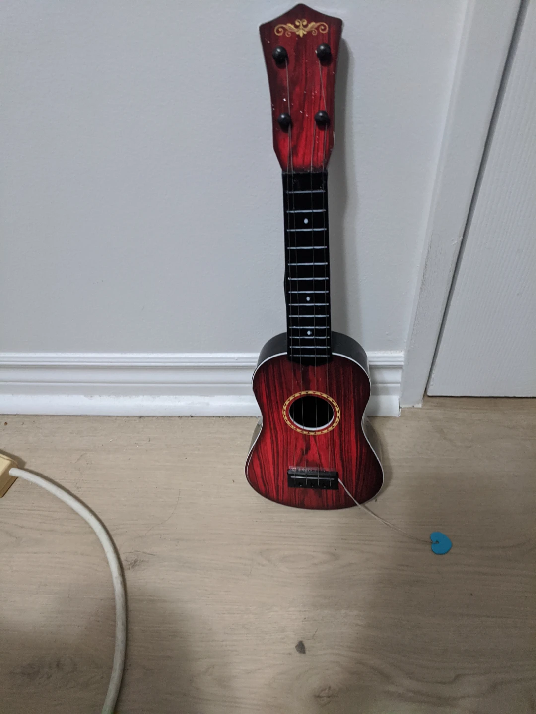 Small Red Wooden Ukulele for kids - photo 5