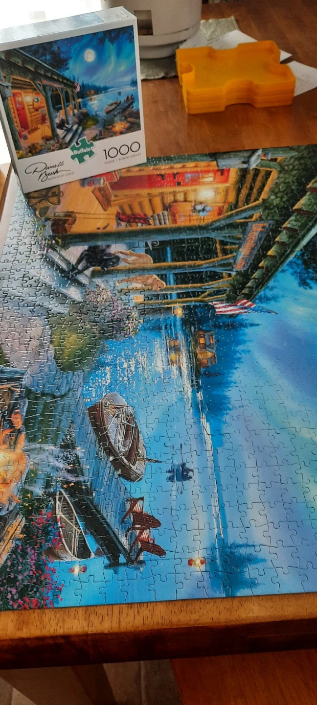 Buffalo 1000pc Puzzle - "Moonlight Lodge".