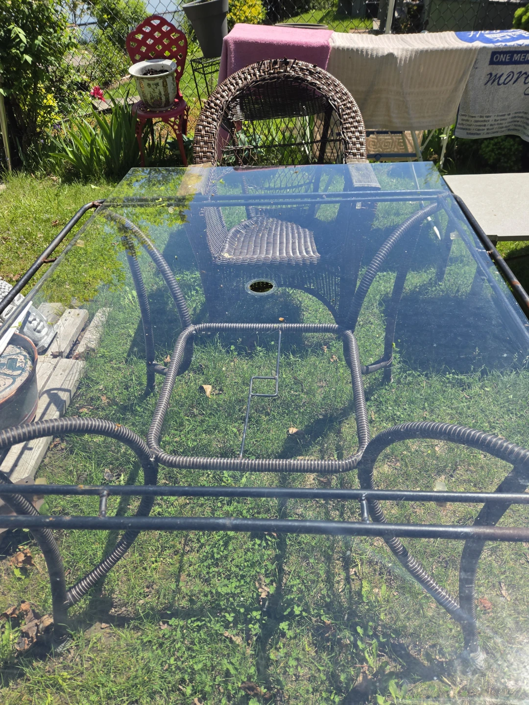 Glass Top Patio Table with Wicker Chairs